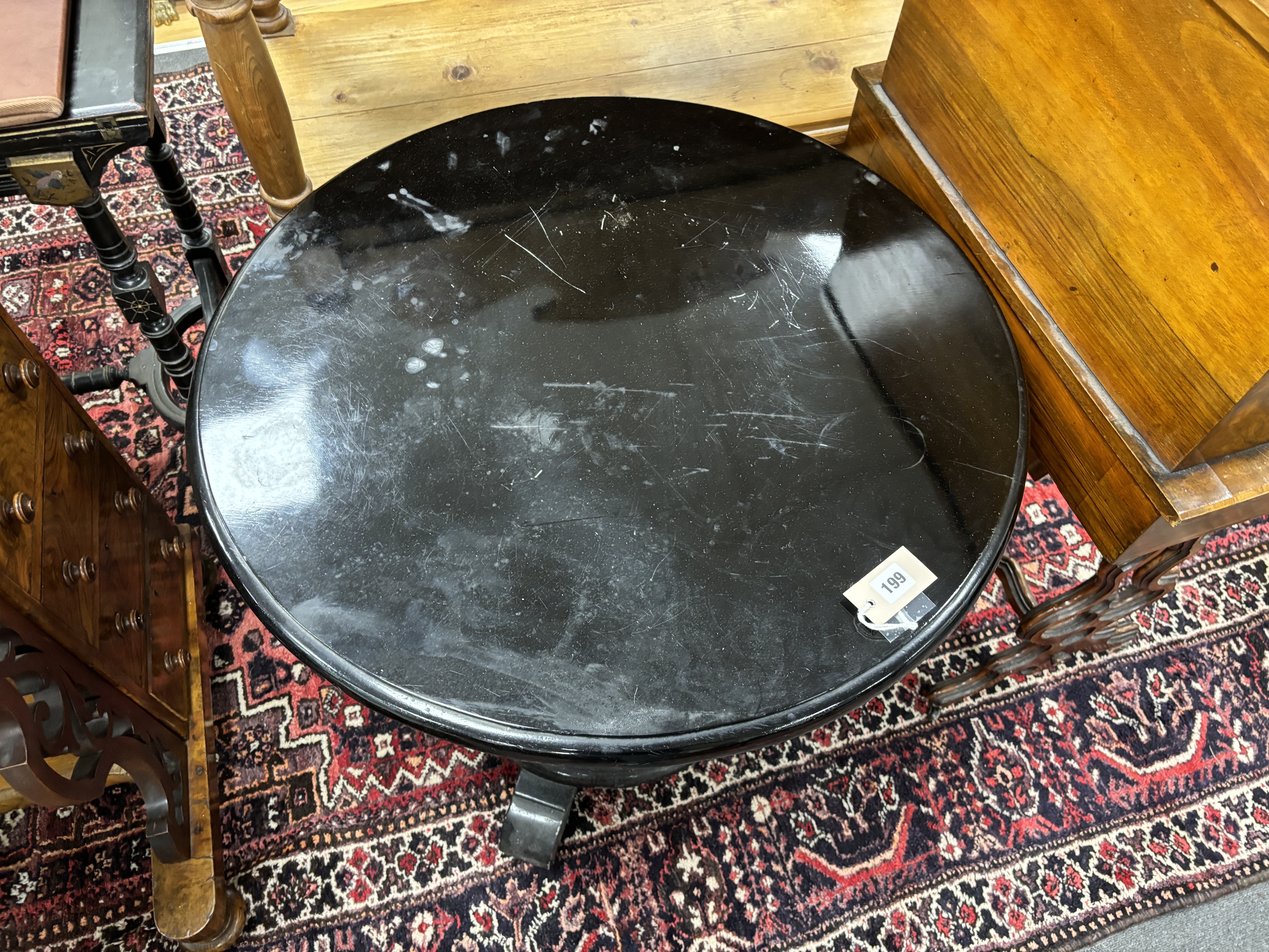 An Art Deco ebonised circular occasional table, diameter 71cm, height 72cm. Condition - poor